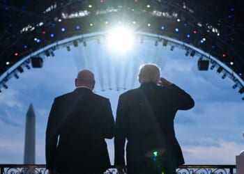 President Donald Trump and UFC CEO Dana White stand on the Blue Room Balcony of the White House as military jets perform a flyover during the UFC Freedom 250 Fight on the South Lawn of the White House on June 14, 2026, in Washington, D.C.