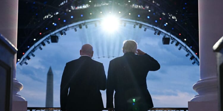 President Donald Trump and UFC CEO Dana White stand on the Blue Room Balcony of the White House as military jets perform a flyover during the UFC Freedom 250 Fight on the South Lawn of the White House on June 14, 2026, in Washington, D.C.