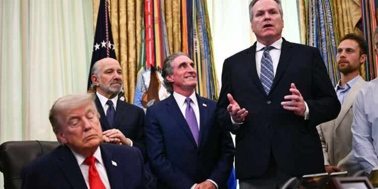President Donald Trump, Commerce Secretary Howard Lutnick and Interior Secretary Doug Burgum listen to Alaska Governor Mike Dunleavy.