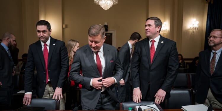 Montana Attorney General Austin Knudsen, Oklahoma Attorney General Gentner Drummond, Missouri Attorney General Andrew Bailey, and Frank O. Bowman III, professor emeritus of law, University of Missouri School of Law, arrive to testify before a House Homeland Security Committee hearing titled "Havoc in the Heartland: How Secretary Mayorkas' Failed Leadership Has Impacted the States," at the U.S. Capitol on Jan. 10, 2024, in Washington, D.C.