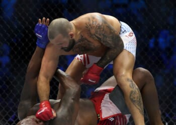 Josh Hokit of the United States lands a punch on Derrick Lewis of the United States during UFC Freedom 250 at the White House on June 14, 2026, in Washington, D.C.