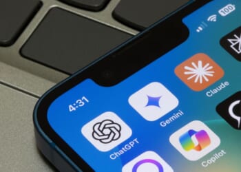 Assorted AI apps, including ChatGPT, Gemini, Claude, Perplexity, Meta AI, Microsoft Copilot, and Grok, are seen on the screen of an iPhone in Portland, Oregon, on May 2, 2025.