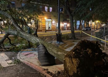Searing heat and storms mar holiday with 3 children dead in Wisconsin and utility outages widespread