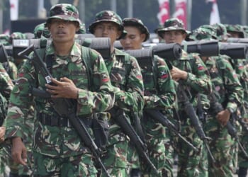 Indonesian troops recover body of U.S. pilot slain by rebels in West Papua