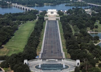 Drained Reflecting Pool reveals Trump’s ‘American flag blue’ liner is now closer to gray