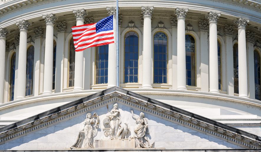 The U.S. flag flies at half-staff at the Capitol in Washington, Monday, July 13, 2026, after the sudden death of prominent Republican Senator Lindsey Graham of South Carolina. (AP Photo/Mariam Zuhaib)