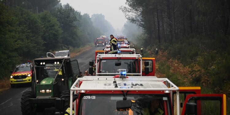 More than 250,000 people flee their homes in France and Spain as wildfires burn