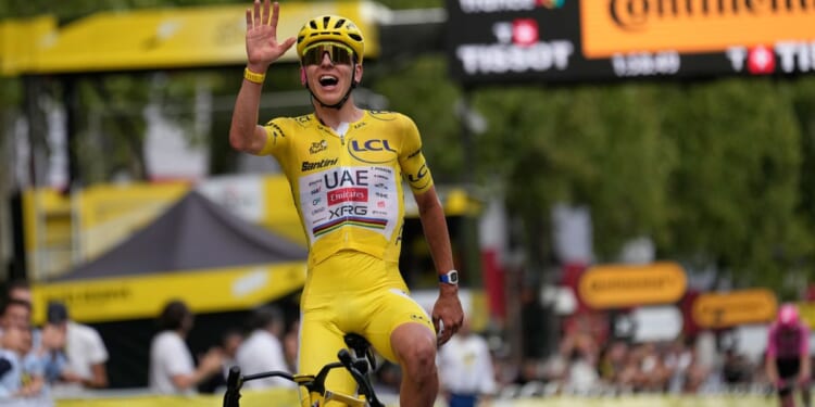 Tadej Pogacar seals his status as a cycling great with record-equaling fifth Tour de France title
