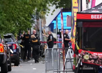 Police search for second suspect following Seattle food festival shooting that killed 3