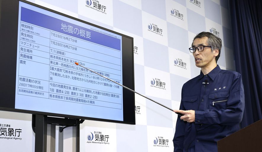 An official at the Japan Meteorological Agency speaks during a news conference in Tokyo, Tuesday, July 28, 2026, following an earthquake in Kumamoto in the Kyushu island, southern Japan. (Masanori Kumagai/Kyodo News via AP)