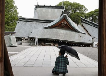 Death toll in Japan earthquake rises to 13 as rescuers search for the missing