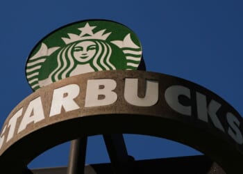 Starbucks reports strong quarterly sales and raises annual outlook