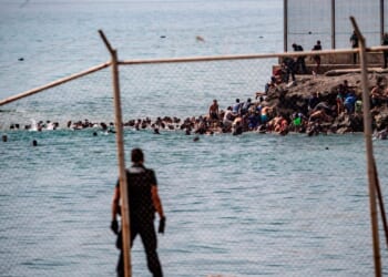 Military called out after thousands breach Moroccan border to enter Spanish city