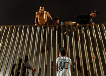At least 18 die after thousands breach border between Morocco and Spanish territory of Ceuta