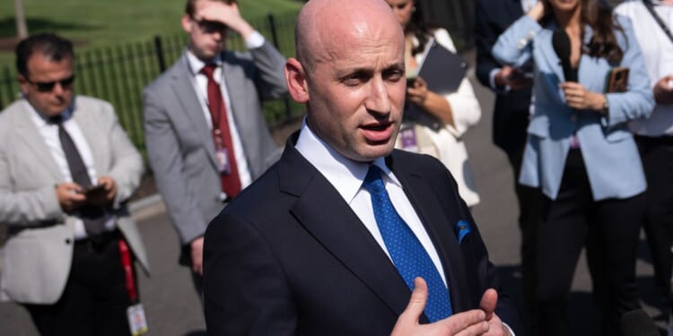Miller, Trump cite Spain migrant surge as warning on Democrats