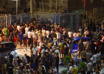 People gather at Bab Sebta on the Morocco-Spain border near Spain's enclave of Ceuta and the Moroccan town of Fnideq, on July 30, 2026.