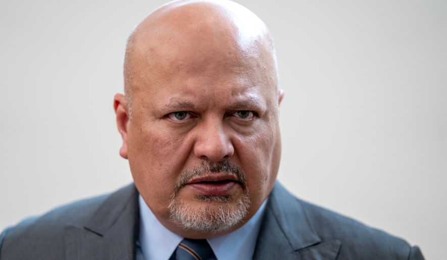 Karim Khan, prosecutor of the International Criminal Court, looks up prior to a press conference in The Hague, Netherlands, July 3, 2023. (AP Photo/Peter Dejong, File)