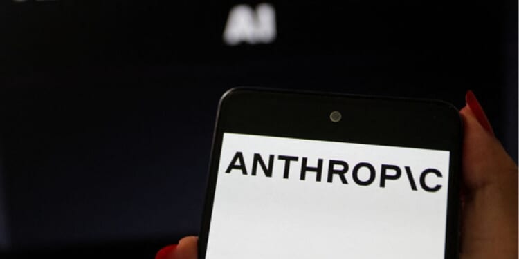 The Anthropic logo is displayed on a bright phone screen on July 11, 2026.