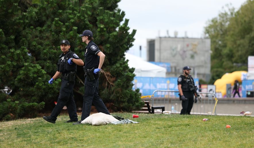 Scene at Seattle Center in Seattle Sunday, July 26, 2026, where a mass shooting has been reported. (Nick Wagner/The Seattle Times via AP)