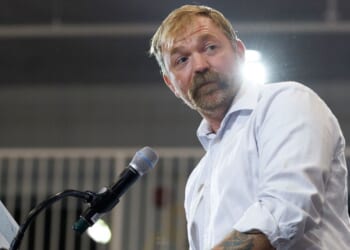 U.S. Senate candidate Graham Platner, a Maine Democrat, speaks at his primary election event on June 9 in Blue Hill, Maine.