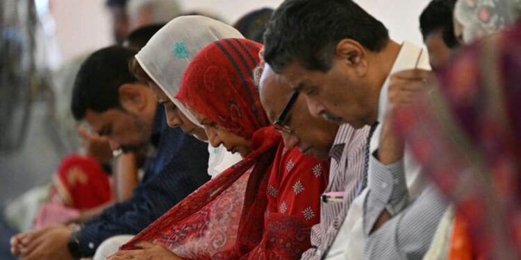 Christians attend an Easter Sunday mass at Central Brooks Memorial Church in Karachi, Pakistan on April 5, 2026.