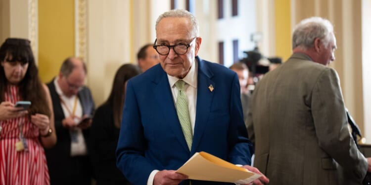 Senate Minority Leader Chuck Schumer attends a Senate luncheon press conference outside the Senate Chamber on July 15, 2026, in Washington, D.C.