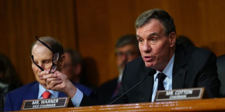 Sen. Mark Warner speaks at the confirmation hearing for Jay Clayton before the Senate Intelligence Committee during his nomination hearing on July 15, 2026, in Washington, D.C.