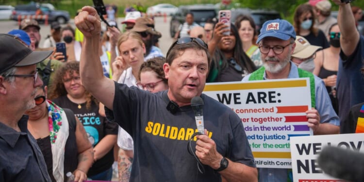 Troy Jackson, a Democratic candidate for U.S. Senate, speaks during a demonstration outside of a federal immigration office after a man was fatally shot by U.S. Immigration and Customs Enforcement agents, on July 14, 2026, in Scarborough, Maine.