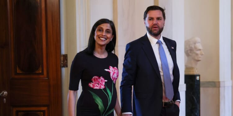 Second Lady Usha Vance and Vice President J.D. Vance arrive for a military mothers celebration in the East Room of the White House on May 6, 2026, in Washington, D.C.