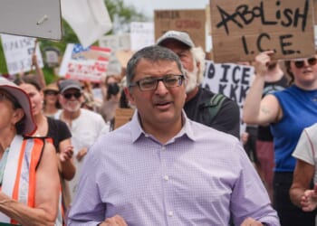 Nirav Shah, Democratic candidate for U.S. Senate, marches during a demonstration outside of a federal immigration office after a man was fatally shot by U.S. Immigration and Customs Enforcement agents, on July 14, 2026, in Scarborough, Maine.