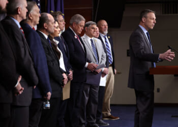 Rep. Scott Perry of Pennsylvania speaks alongside fellow Freedom Caucus members during a press conference.