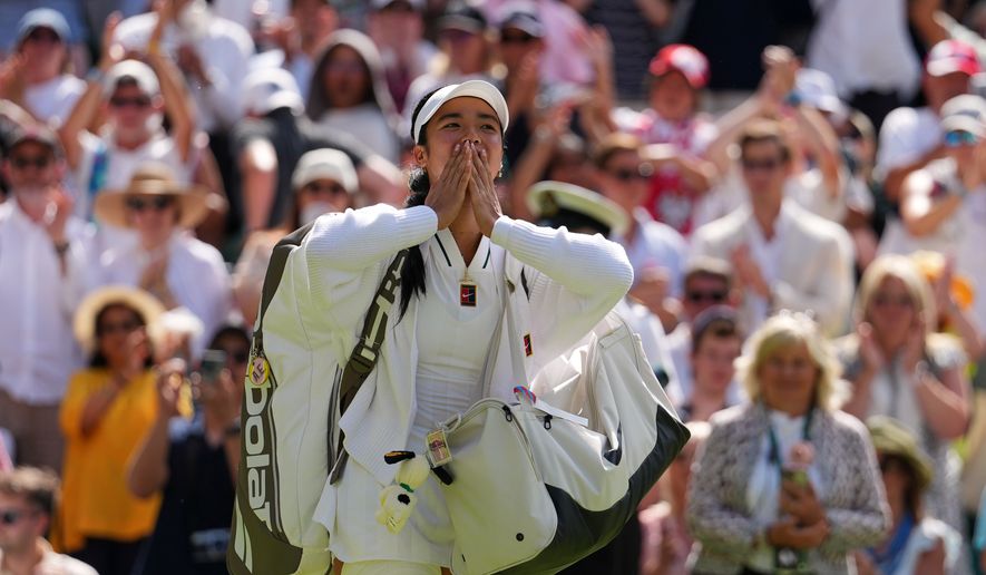 Alexandra Eala of the Philippines blows kisses to the crowd after losing the women's singles fourth round match against Jasmine Paolini of Italy at the Wimbledon Tennis Championships in London, Monday, July 6, 2026.(AP Photo/Kirsty Wigglesworth)