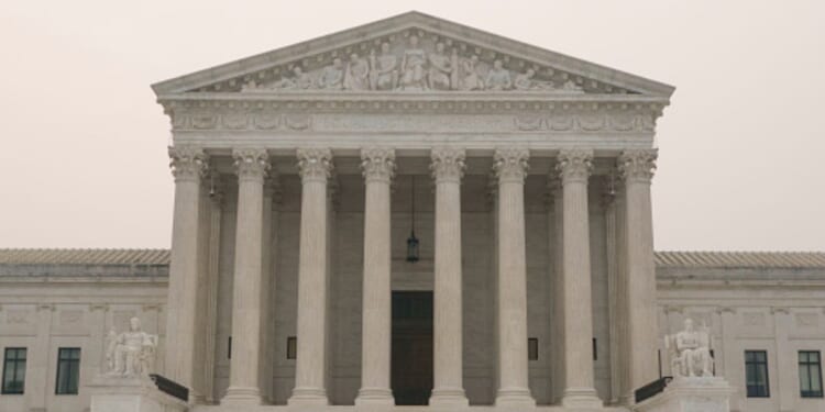 The Supreme Court Building stands at dusk on July 17, 2026.