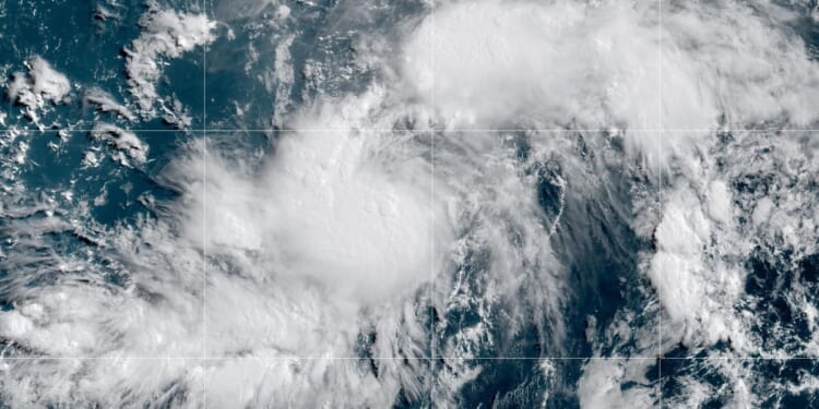 Hurricane Genevieve moves through the Pacific off Mexico, but no direct threat to land is forecast