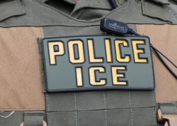 A close-up shot of an ICE official's vest as he provides security in the French Quarter prior to Super Bowl LIX on Feb. 8, 2025 in New Orleans.