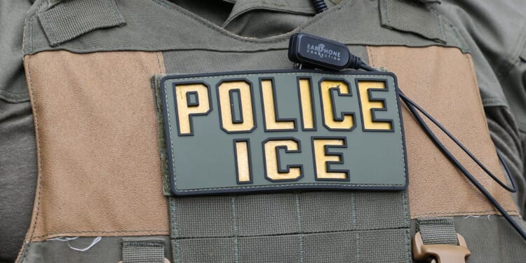 A close-up shot of an ICE official's vest as he provides security in the French Quarter prior to Super Bowl LIX on Feb. 8, 2025 in New Orleans.