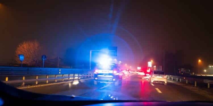 Emergency passage of the police force on the motorway.