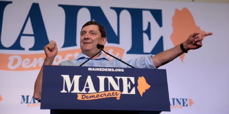 Maine's newly minted Democratic Senate candidate Troy Jackson speaks in Bangor, Maine, on Sunday after becoming his party's official choice to challenge Republican Sen. Susan Collins in November.