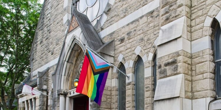 Saint Paul's Episcopal Church in downtown Evansville, Indiana, with a rainbow flag out front on May 13, 2025.