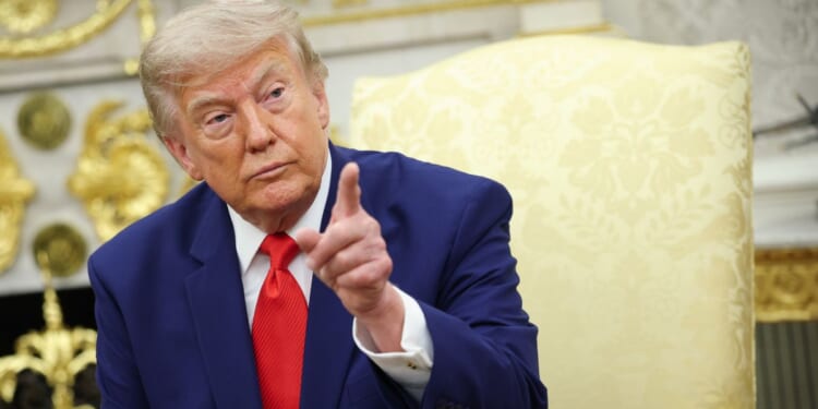 President Donald Trump points during a meeting with President of Lebanon Joseph Aoun in the Oval Office of the White House in Washington on July 21, 2026.