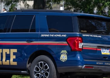 An Immigration and Customs Enforcement vehicle is pictured in a September file photo near the Cook County jail in Chicago.