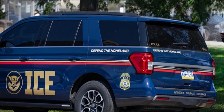 An Immigration and Customs Enforcement vehicle is pictured in a September file photo near the Cook County jail in Chicago.