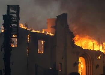 The Altadena Community Church burns during the Eaton Fire on Jan. 8, 2025, in the Altadena section of Pasadena, California.