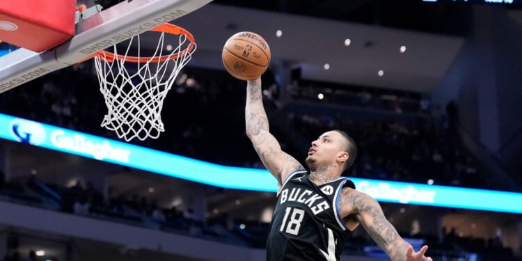Kyle Kuzma of the Milwaukee Bucks scores a dunk during the first half of the game against the Memphis Grizzlies at Fiserv Forum on April 5, 2026, in Milwaukee, Wisconsin.