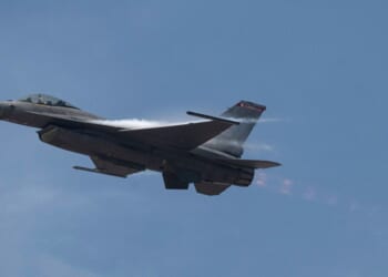 An F-16 fighter jet flies during an exhibition over Las Palmas air base in Lima, Peru, on April 23, 2026.