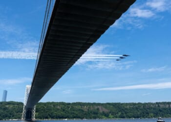 Blue Angel fighter jets fly over the George Washington Bridge on July 4, 2026, in New York City.