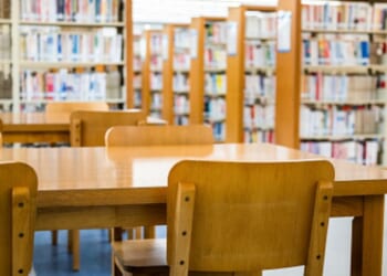 A school library is pictured empty.