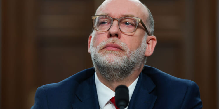 OMB Director Russell Vough listens during a hearing.