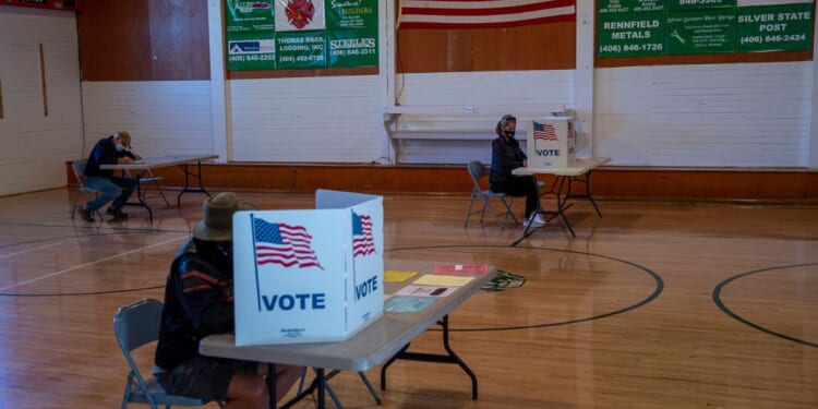 Voters inside the polling location in Elliston, Montana, on Election Day, Nov. 3, 2020.