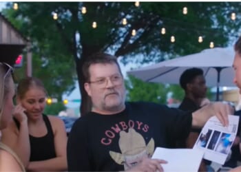 Abortion abolitionist activist T. Russell Hunter engages with a young woman and a college professor in Norman, Oklahoma, as shown in a June 5 video from Abolitionists Rising.